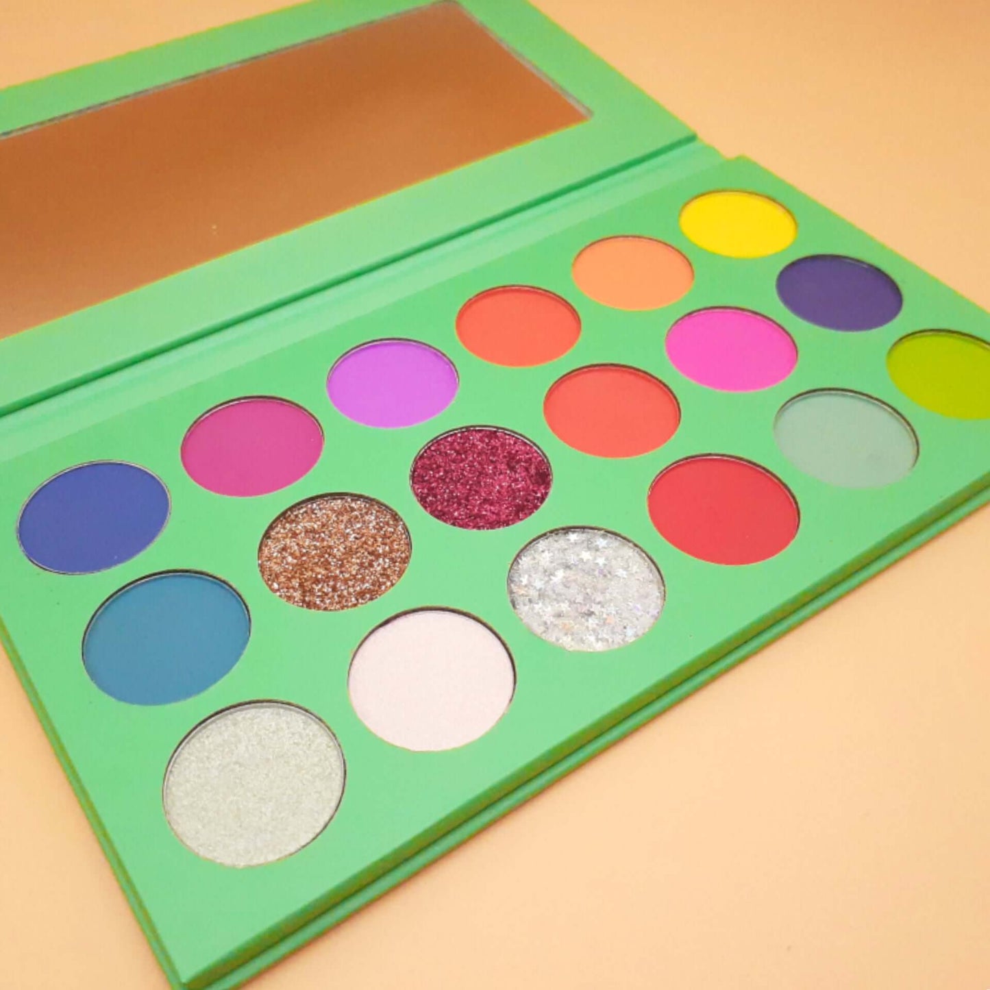 If you love bright color eye shadows, Bold and Luscious Cosmetics 18 color Issa Vibe palette is a great start. It contains all the basic colors to create a look like red, blue, purple, yellow, orange, pink and green. There are also 4 glitter selections on the palette.