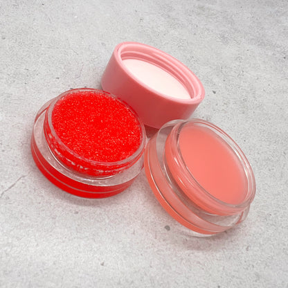 A close up photo of our grainy textured strawberry lip scrub and lip mask. Help fight chapped lips and get softer lips while you sleep!