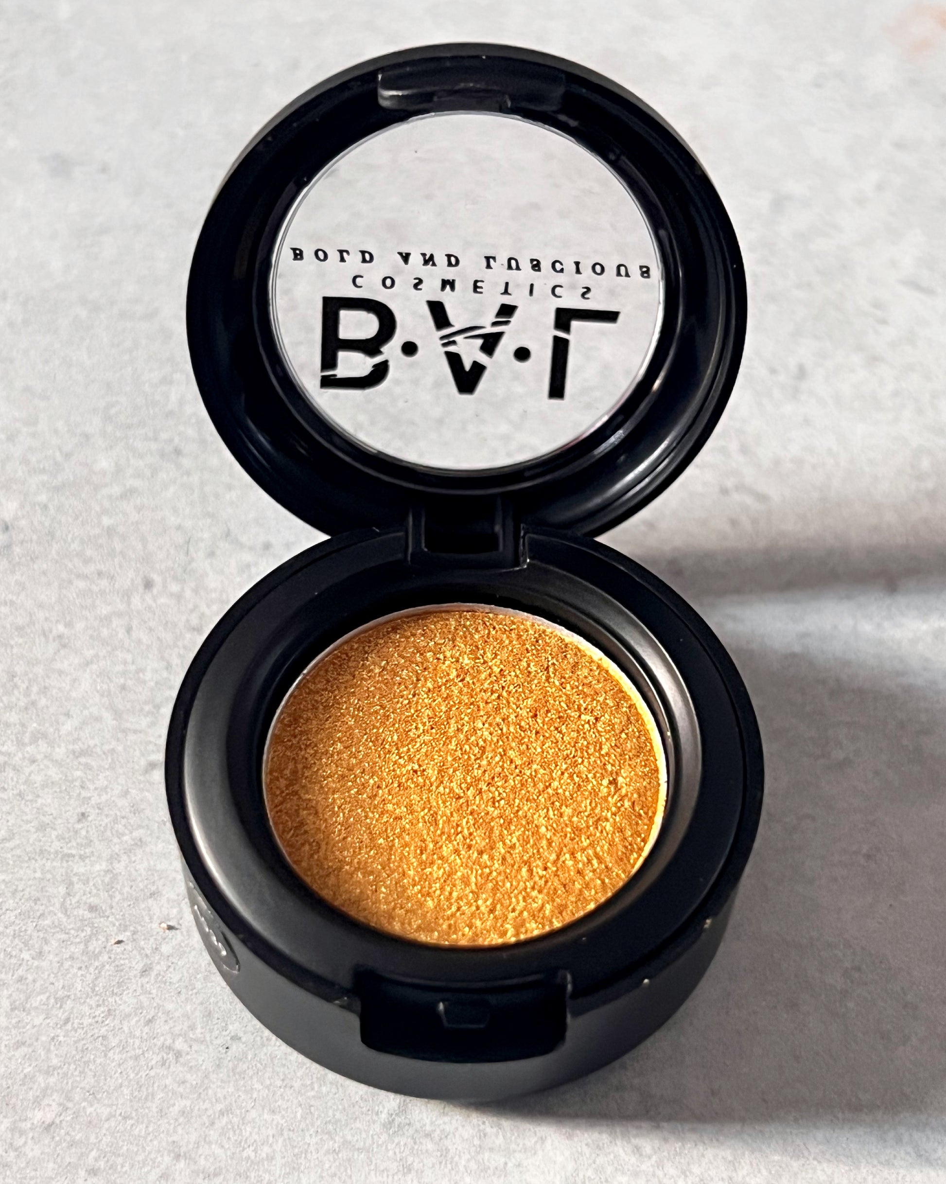 A Golden color that is pure and shimmerry. This is the perfect color to use as a highlight.